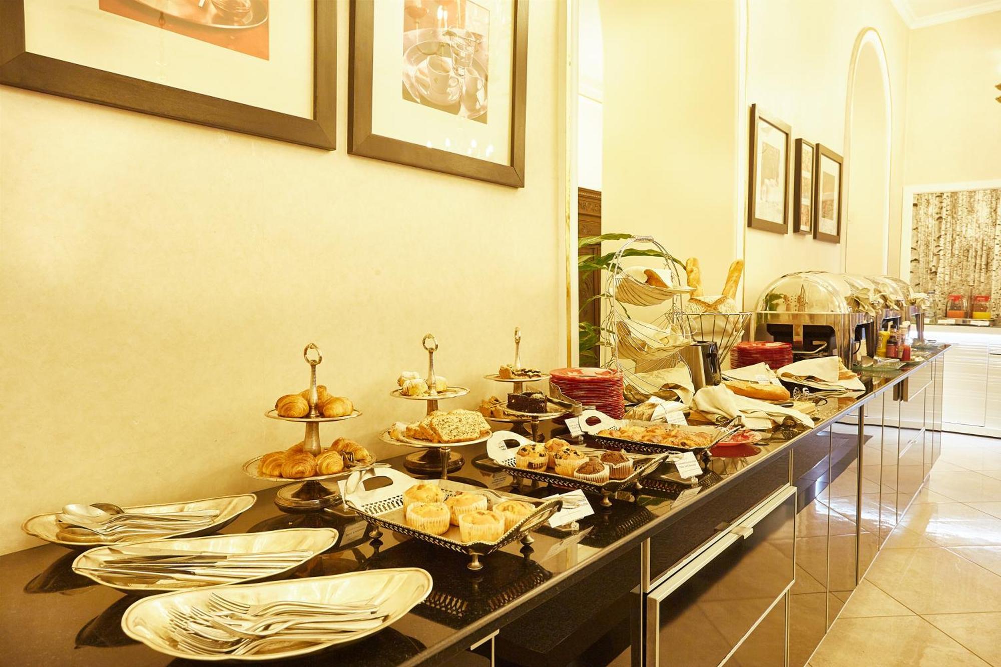 Grand Hotel Continental Bucuresti Exterior photo A buffet at a hotel