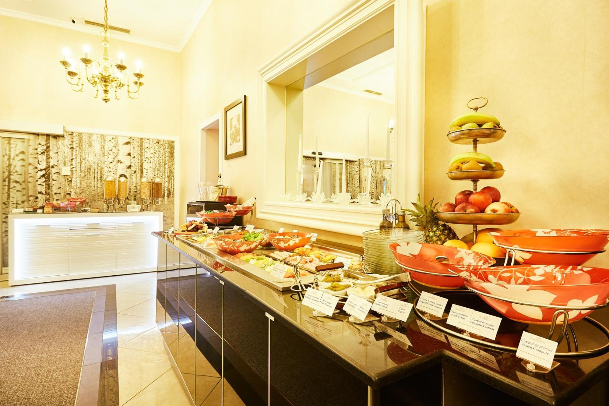 Grand Hotel Continental Bucuresti Exterior photo A buffet at a hotel